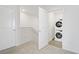 Upstairs laundry room with stacked washer and dryer at 2773 Green Envy Ave # 245, North Las Vegas, NV 89086