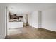 Open concept living and dining area boasts wood floors and natural light at 2773 Green Envy Ave # 245, North Las Vegas, NV 89086