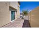 Paver patio offering outdoor space, perfect for relaxation or entertaining, with views of a fence at 2773 Green Envy Ave # 245, North Las Vegas, NV 89086