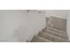 Carpeted staircase leading to the upper level of the home at 2773 Green Envy Ave # 245, North Las Vegas, NV 89086