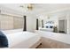 Bright bedroom features a large mirror and natural light from the window with privacy blinds at 2829 Via Florentine St, Henderson, NV 89074