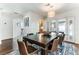 Charming dining room featuring a large wooden table and modern decor for elegant meals at 2829 Via Florentine St, Henderson, NV 89074
