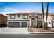 Attractive two-story home showcasing a spacious driveway, well-manicured lawn, and desirable neighborhood setting at 2829 Via Florentine St, Henderson, NV 89074
