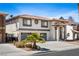 Charming two-story home boasting a well-maintained lawn, two car garage, and inviting curb appeal at 2829 Via Florentine St, Henderson, NV 89074