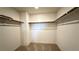 Walk-in closet with carpet and shelving at 2924 Sunday Silence Rd, North Las Vegas, NV 89086