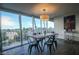 Inviting dining area with ample natural light, showcasing the beautiful views and comfortable seating at 3111 Bel Air Dr # 4B, Las Vegas, NV 89109