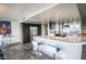 Modern kitchen featuring stainless steel appliances and marble countertops and sleek gray and white cabinetry at 3111 Bel Air Dr # 4B, Las Vegas, NV 89109