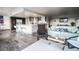 Open concept living and kitchen area featuring an eat-in kitchen with modern furnishings at 3111 Bel Air Dr # 4B, Las Vegas, NV 89109