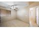 Well-lit bedroom with neutral tones and tiled flooring at 3121 Fontana Colony Ct, North Las Vegas, NV 89031