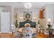 Charming dining area features a decorative chandelier, wood table and accent console at 3185 Mura Del Prato Ave, Henderson, NV 89044
