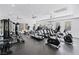 Well-equipped gym featuring treadmills, ellipticals, and weight machines for a complete workout at 3185 Mura Del Prato Ave, Henderson, NV 89044