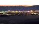 Breathtaking city skyline view showcasing the vibrant lights of the city against the night sky at 35 Via Rizzuto, Henderson, NV 89011