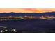 City lights and mountains can be seen in this view, offering a beautiful and peaceful scene at 35 Via Rizzuto, Henderson, NV 89011