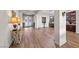 View of the entryway and dining area, showcasing the wood floors and open layout at 35 Via Rizzuto, Henderson, NV 89011