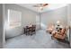 Bright office space with natural light, two armchairs, and a classic wooden desk at 35 Via Rizzuto, Henderson, NV 89011