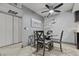 Stylish dining area has a contemporary table and chairs, adjacent to a closet and kitchen at 4200 S Valley View Blvd # 1007, Las Vegas, NV 89103