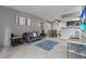 Inviting living room and dining area has stylish decor, tiled flooring, and great natural light at 4200 S Valley View Blvd # 1007, Las Vegas, NV 89103