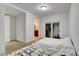 Bedroom featuring a made bed, carpeted floors, and a view into the bathroom at 4525 Dean Martin Dr # 2109, Las Vegas, NV 89103