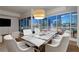 Modern dining room with city views from window at 4525 Dean Martin Dr # 2109, Las Vegas, NV 89103
