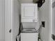 Convenient laundry area with a stacked washer and dryer unit at 4525 Dean Martin Dr # 2109, Las Vegas, NV 89103