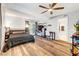 Comfortable bedroom with a ceiling fan, natural light, and vinyl flooring at 4556 Kenilworth Ct, Las Vegas, NV 89147