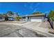 Beautiful single-story home featuring a two-car garage and a well-manicured, low-maintenance front yard at 4556 Kenilworth Ct, Las Vegas, NV 89147