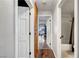 Hallway leading to the bathroom, bedrooms and living area with vinyl flooring at 4556 Kenilworth Ct, Las Vegas, NV 89147