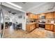 Modern kitchen with stainless steel appliances and adjacent dining area at 4556 Kenilworth Ct, Las Vegas, NV 89147