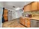Bright eat-in kitchen with stainless steel appliances, tile flooring and natural light at 4556 Kenilworth Ct, Las Vegas, NV 89147