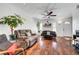 Bright living room with hardwood floors and ample seating at 4556 Kenilworth Ct, Las Vegas, NV 89147
