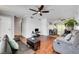 Spacious living room boasts hardwood floors and a ceiling fan at 4556 Kenilworth Ct, Las Vegas, NV 89147