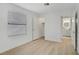 Spacious bedroom with hardwood floors, closet, and bathroom access at 5171 Lindell Rd # 201, Las Vegas, NV 89118