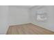 Bright bedroom with hardwood floors and a large window, offering plenty of natural light at 5171 Lindell Rd # 201, Las Vegas, NV 89118