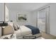 Cozy bedroom with natural light, soft carpet, and stylish decor at 5171 Lindell Rd # 201, Las Vegas, NV 89118