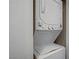 Space-saving stacked washer and dryer in a dedicated laundry area at 5171 Lindell Rd # 201, Las Vegas, NV 89118
