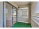 Enclosed patio offers a private outdoor space with artificial turf and a view at 5171 Lindell Rd # 201, Las Vegas, NV 89118