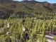 Secluded cabin nestled among the trees in a mountain community at 5230 Whispering Robin Ln, Mount Charleston, NV 89124
