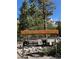 Whispering Pines community sign, mailboxes and mountain view at 5230 Whispering Robin Ln, Mount Charleston, NV 89124