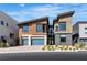 Modern two-story home with a two-car garage and contemporary architectural design at 5364 Succulent Rose Dr, Las Vegas, NV 89135