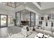 Bright, modern living room featuring a glass-enclosed office, neutral tones, and seamless indoor-outdoor flow at 5364 Succulent Rose Dr, Las Vegas, NV 89135