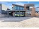 Contemporary home with expansive glass doors opening to a spacious outdoor area, perfect for entertaining at 5364 Succulent Rose Dr, Las Vegas, NV 89135