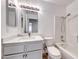 Updated bathroom featuring new vanity and shower-tub combo at 5639 Guiding Star Cir, North Las Vegas, NV 89031