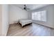 Spacious bedroom with wood-look flooring, and ample natural light at 5639 Guiding Star Cir, North Las Vegas, NV 89031