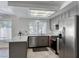 Modern kitchen featuring stainless steel appliances, quartz countertops, and plenty of cabinet space at 5639 Guiding Star Cir, North Las Vegas, NV 89031
