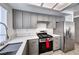 Modern kitchen with quartz countertops, stainless steel appliances and ample cabinet space at 5639 Guiding Star Cir, North Las Vegas, NV 89031