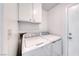 Convenient laundry room equipped with washer and dryer at 5639 Guiding Star Cir, North Las Vegas, NV 89031