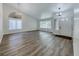 Open-concept living area with updated flooring, modern lighting, and a bright, welcoming atmosphere at 5639 Guiding Star Cir, North Las Vegas, NV 89031