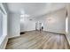 Spacious living room with hardwood floors, vaulted ceiling, and natural light at 5639 Guiding Star Cir, North Las Vegas, NV 89031