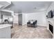 Living room featuring tile flooring, neutral paint, and fireplace at 5639 Guiding Star Cir, North Las Vegas, NV 89031