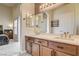Bathroom featuring a double sink vanity and large mirror at 67 Dow Jones St # 2, Henderson, NV 89074